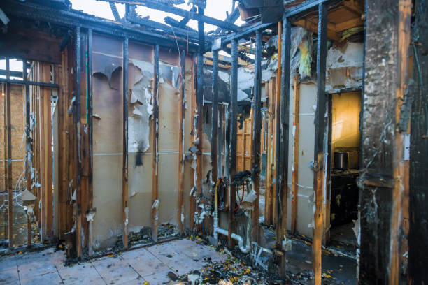 Professional Fire Damage Restoration technician working in Keshena, WI